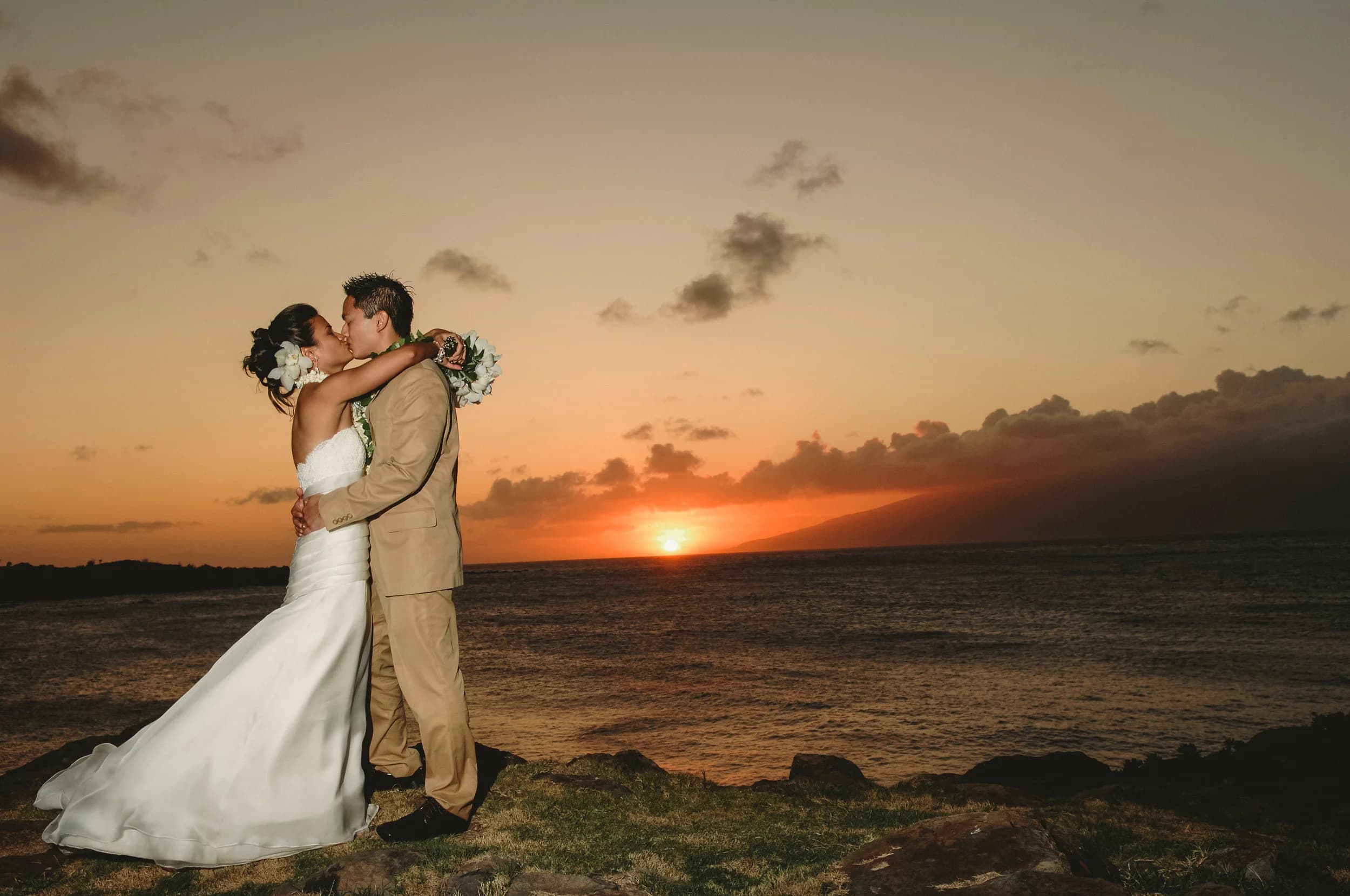 Destination wedding photographed on the cliffs of Kapalua, Maui